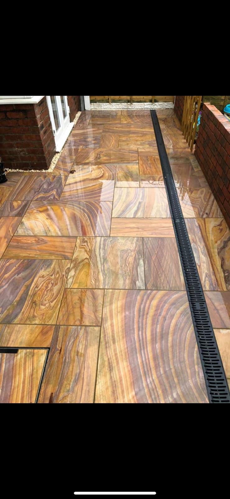 Rainbow sandstone patio laid in an Essex garden